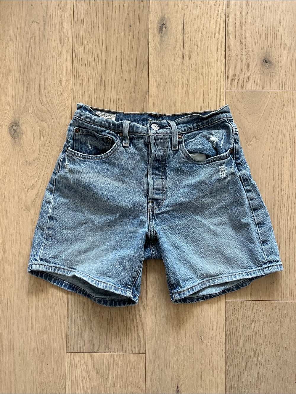 501 Levi's Light Blue Distressed Denim Shorts